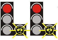 La possibilité de passer au feu rouge pour un vélo peut apparaître directement sur le feu.